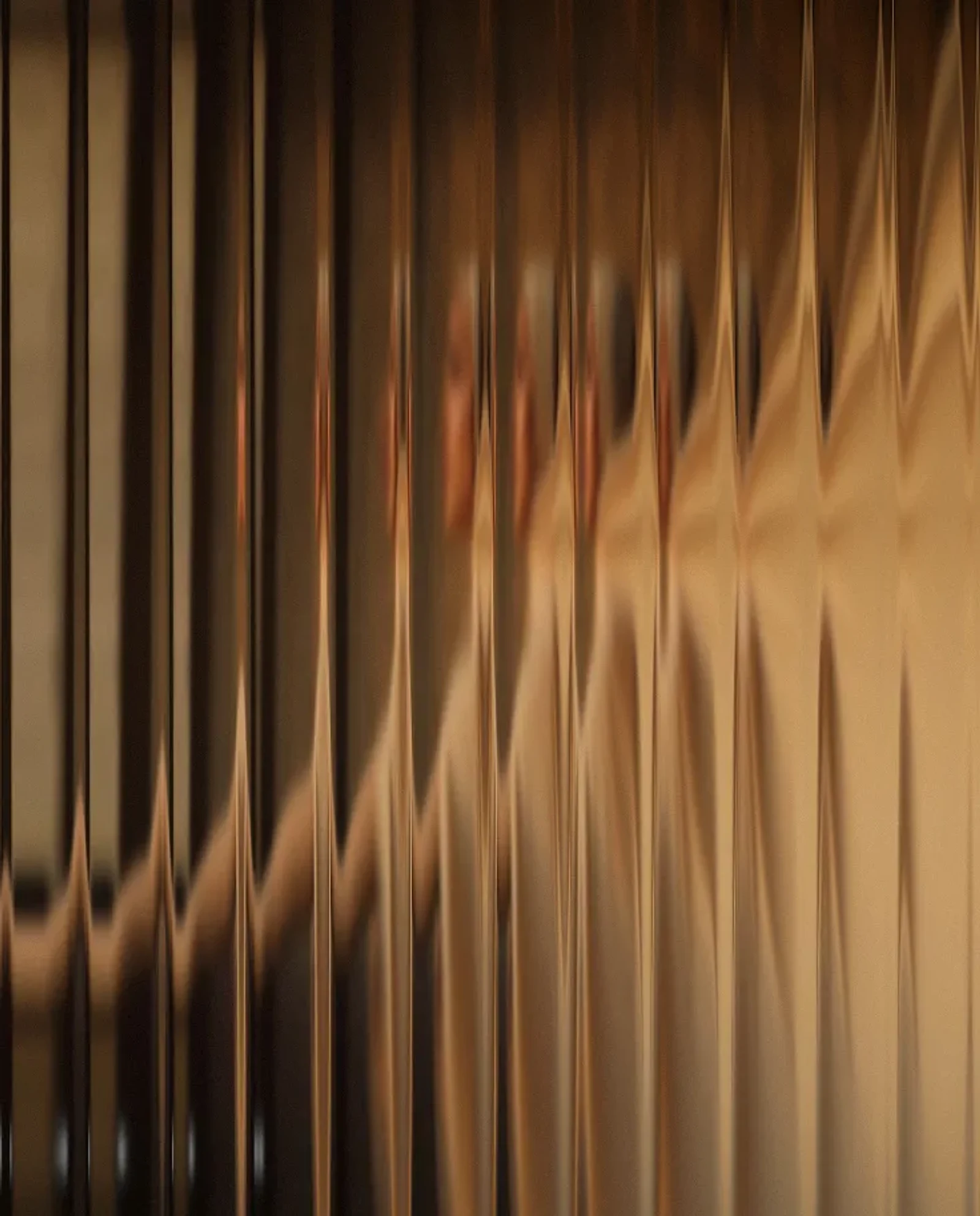 Warm amber reeded glass detail